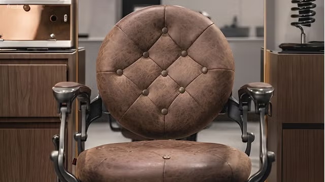Classic leather barber chair at Scissors & Razors gents salon in Dubai
